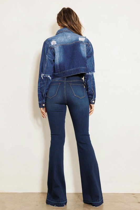 High rise flare jean w faded wash hem detail
