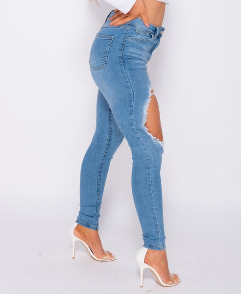 extreme distressed high waist skinny jeans